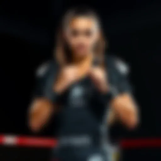 Alexa Grasso ready for her fight Alexa Grasso stands confidently in a fighting stance, showcasing her determination ahead of her match against Manon. She is dressed in fight gear with a focused expression.