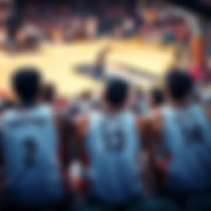 Basketball players on the bench during a game A group of basketball starters sitting on the bench with their jerseys on, watching the game as the fourth quarter unfolds