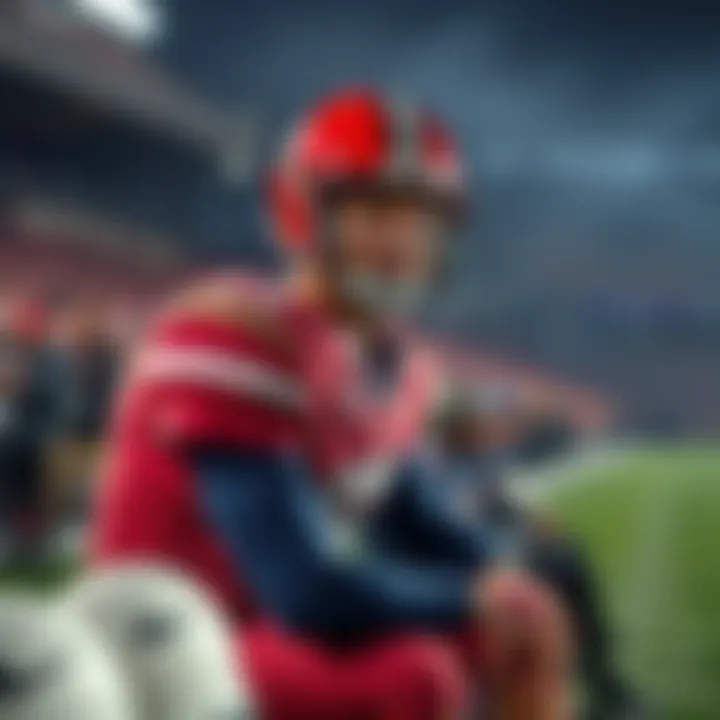 Boise quarterback sitting on the sidelines looking concerned after being pulled from the game