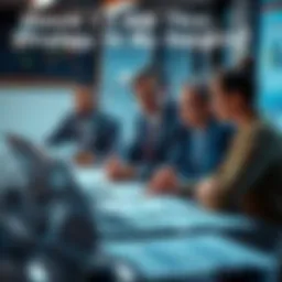 A group of professionals discussing strategy at a table with charts and laptops