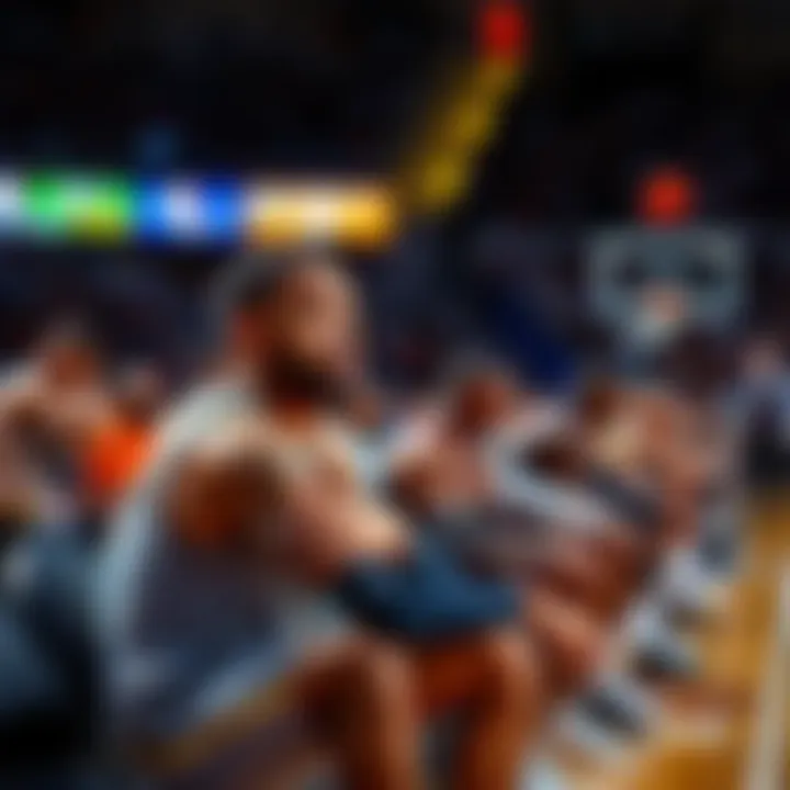 Cade looks concerned while sitting on the bench during the fourth quarter of a tense game, with teammates playing in the background.