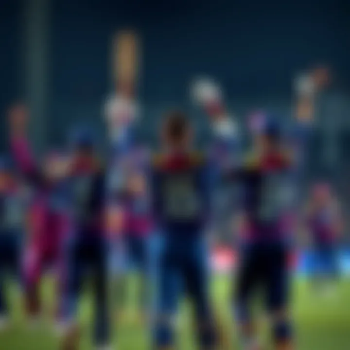 Players in cricket uniforms celebrating with raised arms on the field during an IPL match