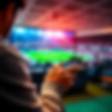 A person placing a live bet on a sports app while watching a game on TV