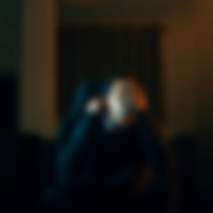 A 42-year-old man sitting alone in a dim room, looking distressed as he holds his head in his hands, symbolizing the struggle with gambling addiction.