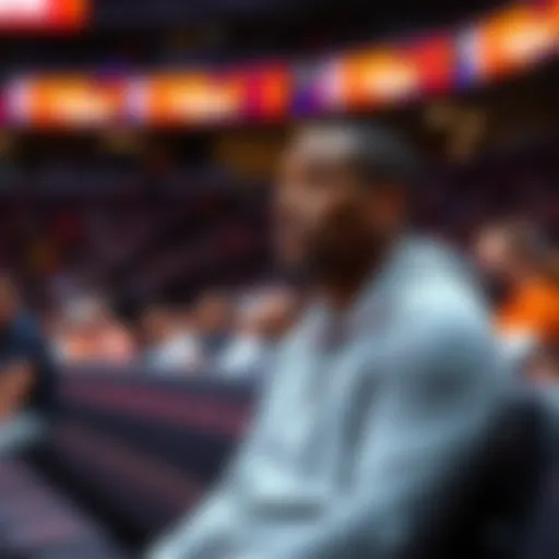Mark Williams sitting on the bench during the fourth quarter of a game as the Suns lose