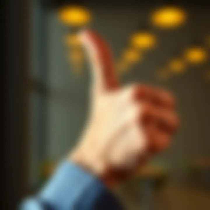 A close-up of a hand giving a thumbs-up sign, symbolizing approval and positivity.